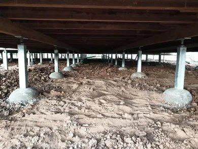 New steel stumps installed under Queensland home during restumping Townsville